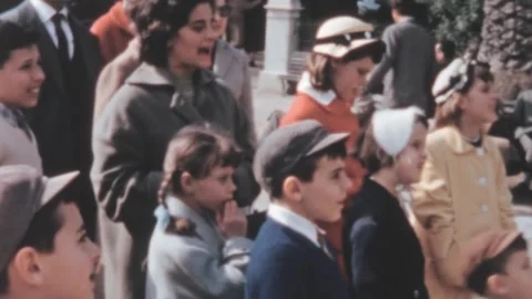 Rome - 1958: Crowd watches a puppet show in Villa Borghese, post-war daily life Stock Footage 281478720