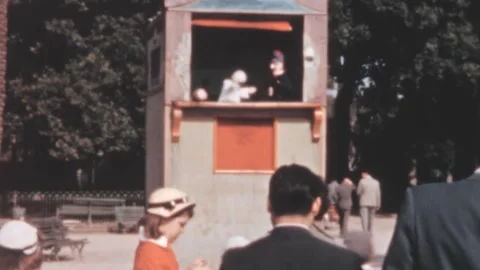 Rome - 1958: Puppet show in Villa Borghese, puppets entertain kids and adults Stock Footage 281478709