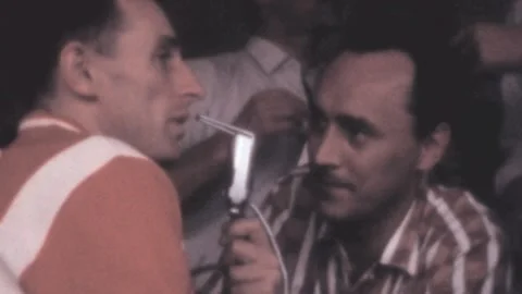 Rome - 1960: Journalist interviewing a player in the Olympic Stadium Rome Stock Footage 168896186