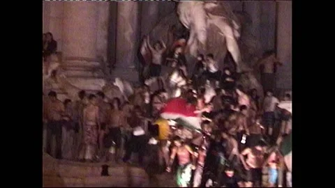 ROME 2006-07-09-TREVI'S FOUNTAIN-SUPPORTERS CELEBRATING ITALY'S MONDIAL VICTORY Stock Footage