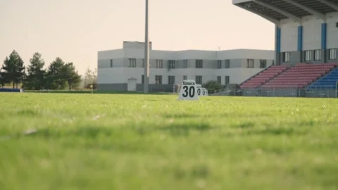 Rome, 8 June 2024: Discus throwing markings on grass at the stadium Stock Footage 320393227