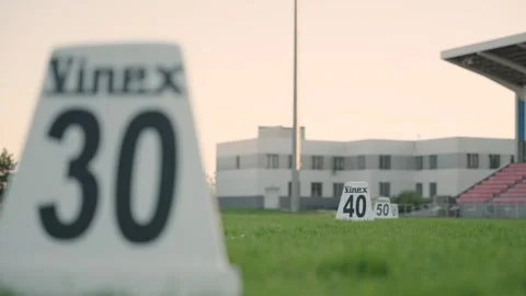 Rome, 8 June 2024: Discus throwing markings on grass at the stadium Stock Footage 320393412