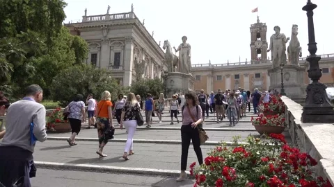 Rome, Capitoline Steps, view of Palazzo Senatorio, people walk. Stock Footage