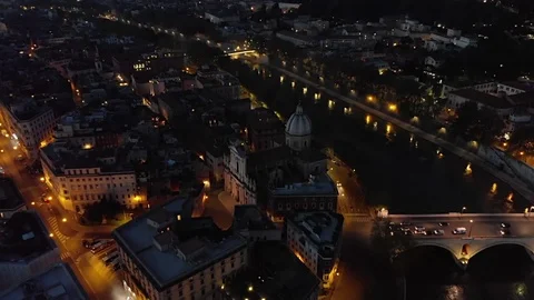 ROME ITALY AERIAL DRONE NIGHT SHOT OVER TIBER RIVER Stock Footage