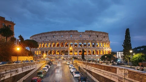 Rome, Italy. Colosseum. Traffic Near Flavian Amphitheatre During Sunset, Evening Stock Footage