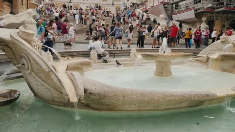 Rome, Italy, June 2017:The famous Spanish staircase with a fountain Barcaccia Stock Footage