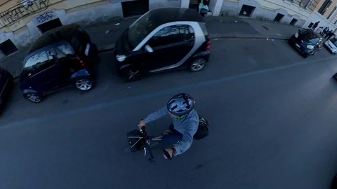 Rome, a man rides a bicycle in the ancient center at dusk, 360 effect Stock Footage 106432573