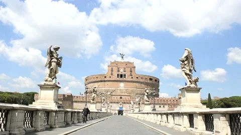 Rome, May 1st 2020: Man walking on Holy Angel Castle bridge during lockdown Stock Footage 148794394