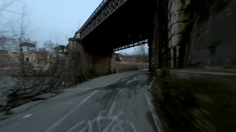 Rome Moving view of  Tiber River and his bridges at dusk, along the bicycle lane Stock Footage 104401690