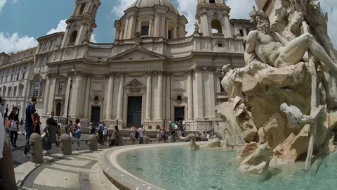 Rome - Navona square wide view of the central fountain with pan movement Stock Footage 89764241