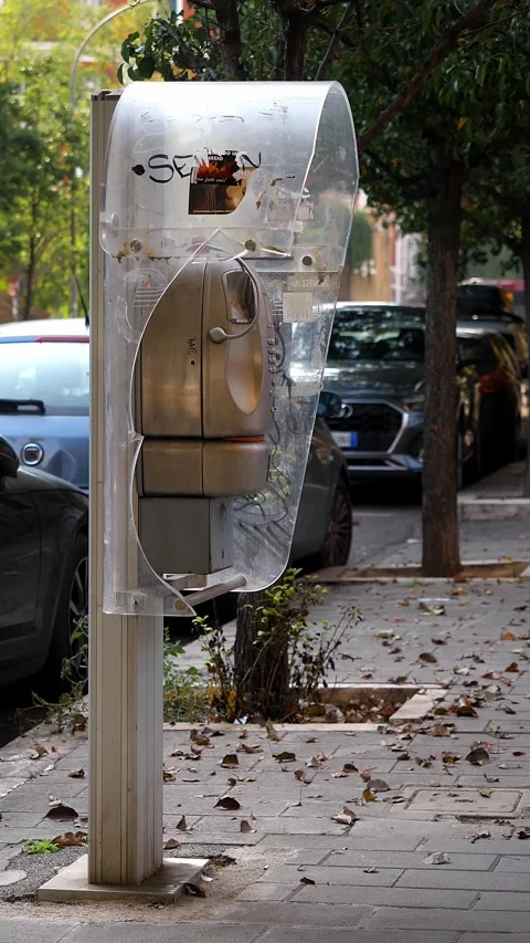 Rome, October 2, 2025: Abandoned phone booth on Rome street Stock Footage 335695577