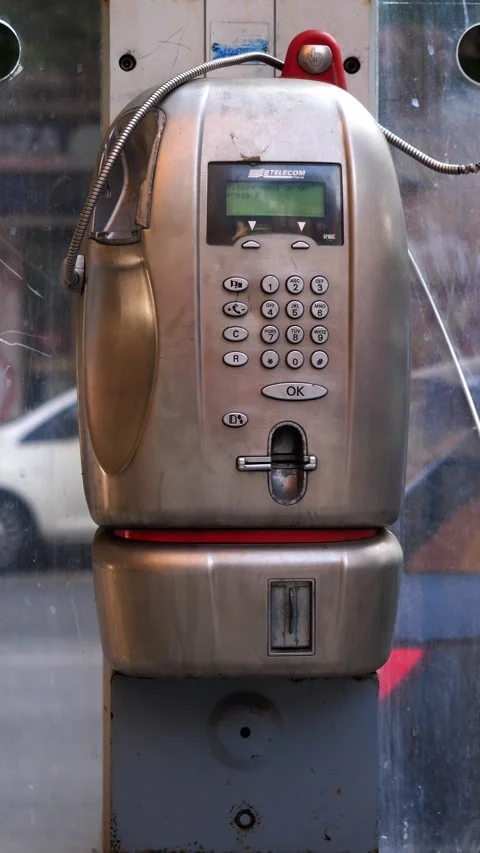 Rome, October 2, 2025: abandoned public phone booth on Rome street Stock Footage 335695597