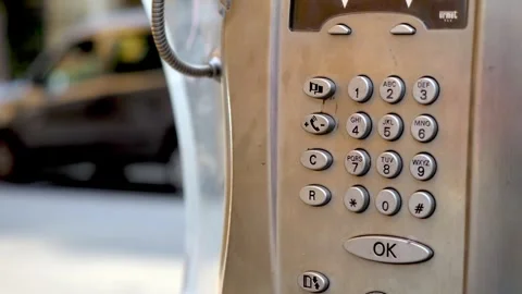 Rome, October 2, 2025: Close up of vintage public telephone keypad Stock Footage 335695572