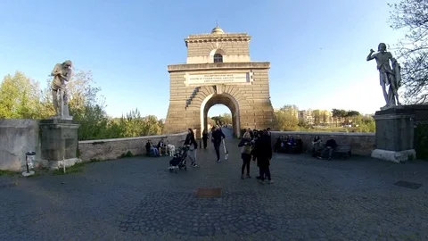 Rome, Passing trough the tower of the ancient Bridge Milvio at sunset 360 effect Stock Footage 106432841