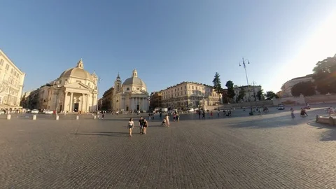 Rome, Piazza del Popolo, around the obelisk by bike at sunset, people walking Stock Footage 112876282
