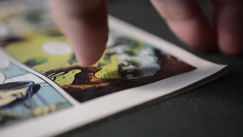 Rome, Ro, Italy 10 15 2025: comics book reading. superhero comic read. Stock Footage 318959631