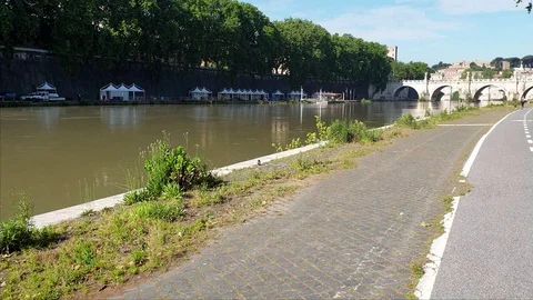 Rome, shooting in motion along the Tiber river with ancient bridges Stock Footage 108585147