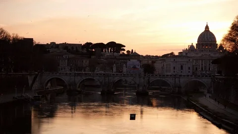 Rome sunset behind the Vatican Dome with the Tiber river and birds Stock Footage 104967705