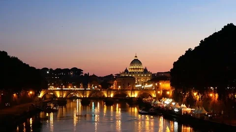 Rome twilight view of St. Peter dome, Tiber river and St. Angel bridge Stock Footage