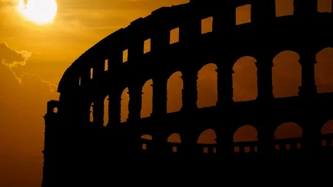 Rome: View of Iconic Colosseum (or Coliseum) Amphitheatre at Sunset, Roma, Italy Stock Footage 102486344