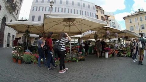 Rome - Walking between stalls and crowd in the ancient market of Campo dei Fiori Stock Footage 89764245