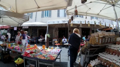 Rome - Walking between stalls and crowd in the ancient market of Campo dei Fiori Stock Footage 89765595