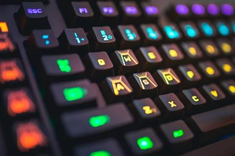 Romer-G backlit mechanical keyboard WSAD buttons detail shot. Stock Photos