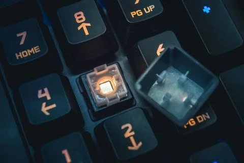 Romer-G backlit mechanical keyboard numerical buttons detail shot. Stock Photos