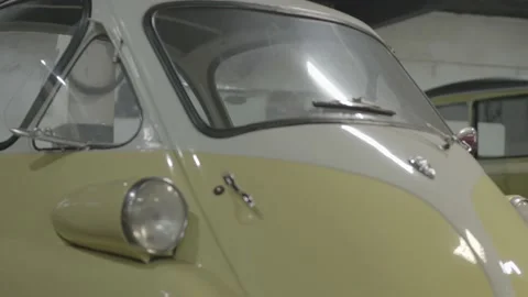Romi-Isetta on a garage with several old vintage cars. Vídeos de archivo 136138587
