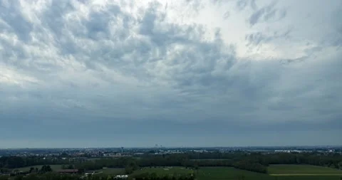Roncello, Italy hyperlapse clouds over Lombardy landscape Stock Footage 331957197