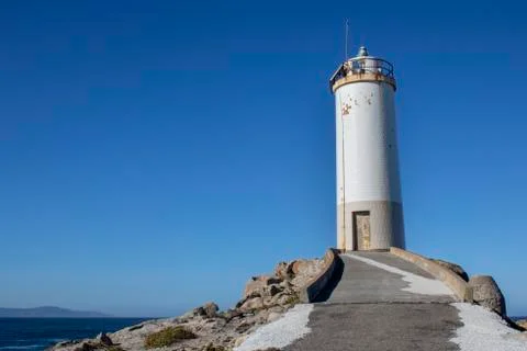Roncudo lighthouse. Stock Photos
