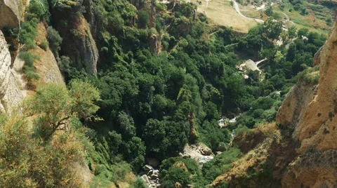 Ronda sunny day view down from the bridge 4k spain Stock Footage 67552700