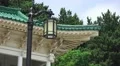 Roof of Asian Shrine Lamp Post And Trees At The Chungnyeolsa HD HD Footage