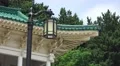 Roof of Asian Shrine Lamp Post And Trees At The Chungnyeolsa 4K 4k or 4k+ Resolution