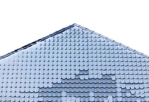 A roof covered in snow with a triangular shape 写真素材