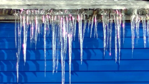 The roof melting icicles Stock Footage 71270928