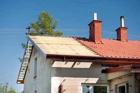 Roof renovation exposed timber rafter and tiles Stock Photos