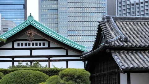 The roof shingles of the temples inside Imperial Palace gardens in Tokyo Japa Stock Footage 121401352