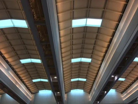 Roof Structure with Reflected Lights Viewed Inside the Building Stock Photos