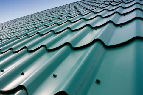 Roof tile pattern, close up. Over blue sky Stock Photos