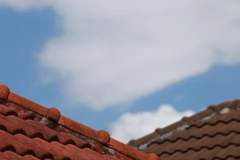 Roof tiled with red brick Stock Photos