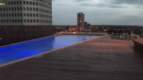 Roof top pool city views  part 2 Stock Footage