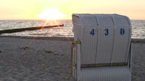 Roofed Wicker Beach Chair at Sunset - Baltic Sea, Northern Germany 스톡 동영상 40797320