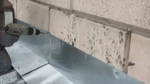 Roofer fix metal to a wall Video stock 68884558