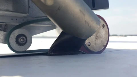 Roofer use welding machine for synthetic membrane on flat roof structure. Stock Footage 143149504