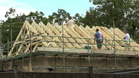 Roofers working on a barn conversion. Video stock 52743688