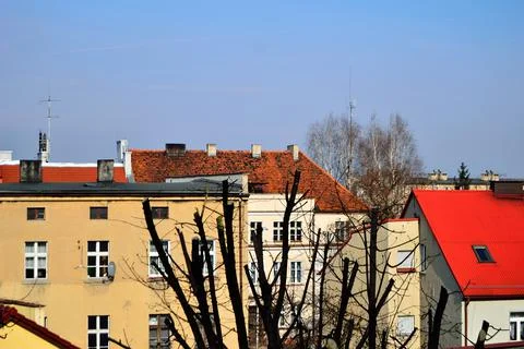 Roofs and windows in multi-family buildings from a bird's perspective. Summer Stock Photos