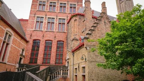 Roofs And Windows Of Old Authentic Brick Houses In Bruges, Belgium Stock Photos