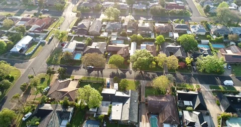 Roofs, yards, facades and pools of residential houses in Dubbo city as 4k. Stock Footage 140940486