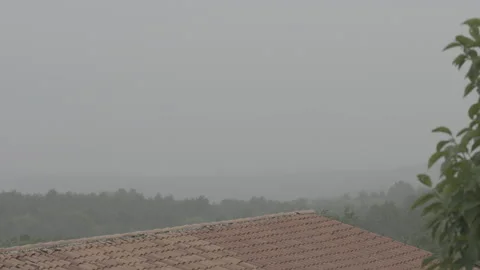 Rooftop and an approaching thunderstorm Stock Footage 160154484